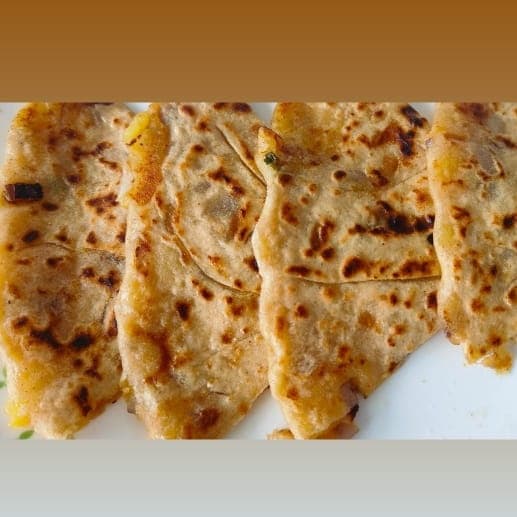 Paneer Pyaaz Parathas in Ghee with Yogurt