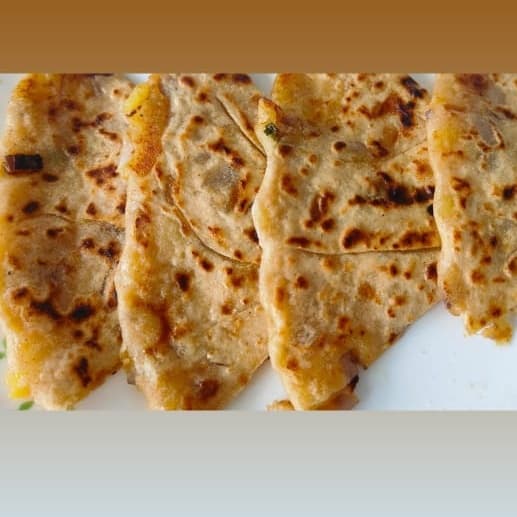 Aalo Pyaaz Parathas in Ghee with Yogurt